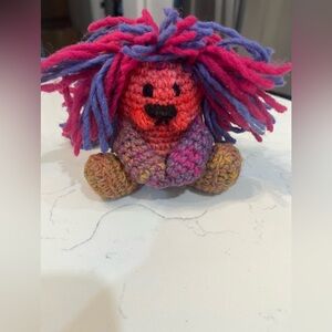 Plush Crochet Lion Toy in Pink & Purple Yarn